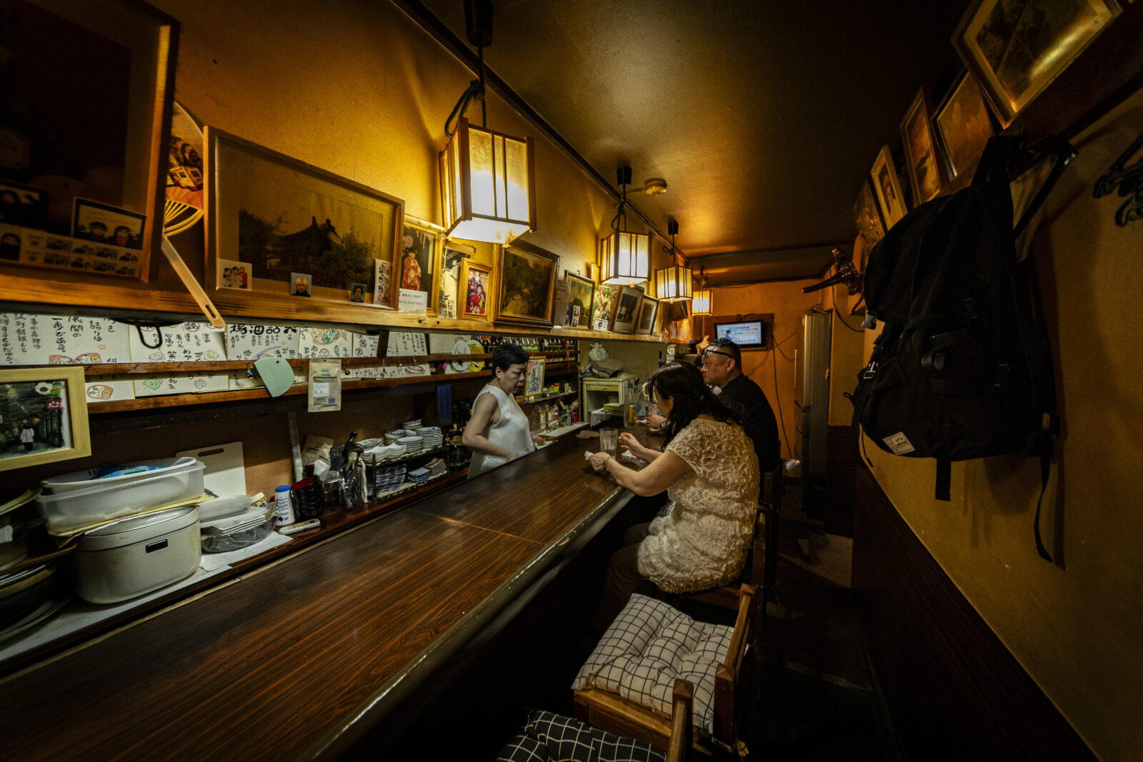 A Famous Duo: The Soothing Owner and the Energetic “Mama”